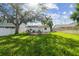 Lush backyard featuring a well-manicured lawn and outdoor seating area at 206 N Beverly Ave # 1/2, Tampa, FL 33609