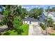 Charming single-story home with a well-manicured lawn, and a driveway at 206 N Beverly Ave # 1/2, Tampa, FL 33609