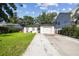 Charming home featuring a well-manicured lawn and cozy front patio seating at 206 N Beverly Ave # 1/2, Tampa, FL 33609