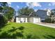 Charming home featuring a well-manicured lawn and cozy front patio seating at 206 N Beverly Ave # 1/2, Tampa, FL 33609