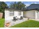Inviting front porch with decorative wreath and stylish exterior lighting at 206 N Beverly Ave # 1/2, Tampa, FL 33609