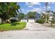 Inviting single-story home with a lush green lawn and driveway at 206 N Beverly Ave # 1/2, Tampa, FL 33609