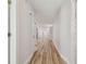 Hallway with wood-look tile and neutral walls at 206 N Beverly Ave # 1/2, Tampa, FL 33609