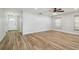 Living room featuring wood-look tile flooring and a large window at 206 N Beverly Ave # 1/2, Tampa, FL 33609