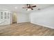 Living room featuring wood-look tile flooring and built-in hutch at 206 N Beverly Ave # 1/2, Tampa, FL 33609