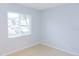 A room with tile flooring, a light-colored wall, and a large window at 220 Berry Tree Pl # 220, Brandon, FL 33510