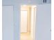 Open doorway shows the tiled floor and freshly painted walls at 220 Berry Tree Pl # 220, Brandon, FL 33510