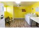 On-site laundry room features modern machines, ample space and a convenient bench at 220 Berry Tree Pl # 220, Brandon, FL 33510