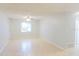 Inviting living area with tile flooring, ceiling fan, and plenty of natural light at 220 Berry Tree Pl # 220, Brandon, FL 33510