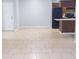 Inviting living area with tile flooring with view to the kitchen at 220 Berry Tree Pl # 220, Brandon, FL 33510
