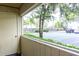 View from the balcony to the parking lot with landscaping at 220 Berry Tree Pl # 220, Brandon, FL 33510