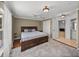 Spacious bedroom boasts wood floors, a plush rug, and lots of natural light at 22829 Saint Thomas Cir, Lutz, FL 33549