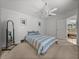 Cozy bedroom featuring a ceiling fan and a light, airy feel at 22829 Saint Thomas Cir, Lutz, FL 33549