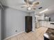 Bright kitchen featuring tile floors, white cabinetry, and modern appliances at 22829 Saint Thomas Cir, Lutz, FL 33549