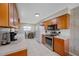 Efficiently designed kitchen with modern appliances, ample storage, and tile flooring at 2308 Cape Bend Ave, Tampa, FL 33613