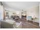 Bright living room featuring hardwood floors, neutral walls, and comfortable seating at 2308 Cape Bend Ave, Tampa, FL 33613