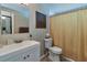 Bathroom showcasing a toilet, vanity and shower curtain at 2848 Homewood St, Clearwater, FL 33759