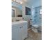 Bathroom featuring a tiled shower, vanity, and toilet at 2848 Homewood St, Clearwater, FL 33759