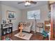 Bedroom showcasing wood floors and a window with blinds at 2848 Homewood St, Clearwater, FL 33759