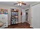 Bedroom featuring a closet with sliding doors, cabinet storage and view of the bathroom at 2848 Homewood St, Clearwater, FL 33759