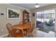 Dining area with access to the screened in lanai and pool area at 2848 Homewood St, Clearwater, FL 33759