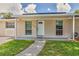 Home exterior showcasing a pristine facade, complemented by a well-kept lawn and a clear walkway at 2848 Homewood St, Clearwater, FL 33759