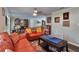 Open living room with stylish furniture, bookcases and comfortable seating at 2848 Homewood St, Clearwater, FL 33759