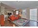 Warm and inviting living room featuring hardwood floors, neutral walls, and a cozy seating arrangement at 2848 Homewood St, Clearwater, FL 33759