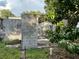 Backyard of home featuring block structure overgrown with foliage at 2909 N 11Th St, Tampa, FL 33605