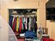 View of a full closet with clothes and storage items at 2909 N 11Th St, Tampa, FL 33605