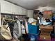 Packed storage room exhibiting ample shelving and storage containers, perfect for organizing household items at 2909 N 11Th St, Tampa, FL 33605