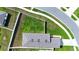 Top-down view of the property's roof and backyard within the context of the neighborhood at 29245 Fedora Cir, Brooksville, FL 34602