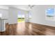 Spacious living room featuring wood-look floors and natural light at 29245 Fedora Cir, Brooksville, FL 34602