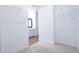Open walk-in closet featuring carpeted floors and shelving units at 29245 Fedora Cir, Brooksville, FL 34602