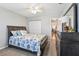 Comfortable bedroom with ceiling fan, closet and dresser at 301 Canton Ct # 77, Sun City Center, FL 33573