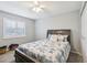 Well-lit bedroom with window blinds, a queen bed and closet at 301 Canton Ct # 77, Sun City Center, FL 33573