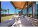 Inviting community patio area with comfortable seating, tables, and picturesque views of the surroundings at 31504 Hayman Loop, Wesley Chapel, FL 33545