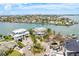 Sprawling waterfront estate boasts of impeccable landscaping, multiple homes, and stunning curb appeal at 442 Midway Is, Clearwater Beach, FL 33767