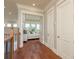 Hallway opens to this bedroom featuring a daybed overlooking a water view at 442 Midway Is, Clearwater Beach, FL 33767