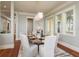 Bright dining area features seating for six with waterfront views at 442 Midway Is, Clearwater Beach, FL 33767