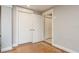 Hallway features tile flooring, fresh neutral paint, and convenient access to closet space at 442 Midway Is, Clearwater Beach, FL 33767