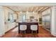 Spacious kitchen features island with bar stools, custom cabinets, and modern appliances at 442 Midway Is, Clearwater Beach, FL 33767