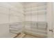 Spacious walk-in pantry with custom shelving at 442 Midway Is, Clearwater Beach, FL 33767
