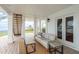 Covered outdoor patio with comfortable seating, views, and access to the waterfront at 442 Midway Is, Clearwater Beach, FL 33767