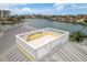 Expansive rooftop deck offering sweeping views of the surrounding cityscape and bay at 442 Midway Is, Clearwater Beach, FL 33767