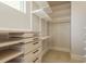 Walk-in closet with built-in drawers, and shelves at 442 Midway Is, Clearwater Beach, FL 33767