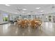 Spacious common room featuring billiard table, table tennis and seating areas with ample lighting at 4540 Overlook Ne Dr # 246, St Petersburg, FL 33703