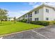 Exterior of property with manicured lawn and garden at 4540 Overlook Ne Dr # 246, St Petersburg, FL 33703