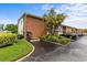 Apartment building showcasing a brick exterior, well-maintained landscaping, and convenient parking at 4540 Overlook Ne Dr # 246, St Petersburg, FL 33703