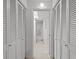 Hallway with closet and doorway to bathroom at 4540 Overlook Ne Dr # 246, St Petersburg, FL 33703